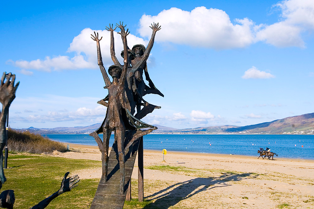 photo of statues near the beach