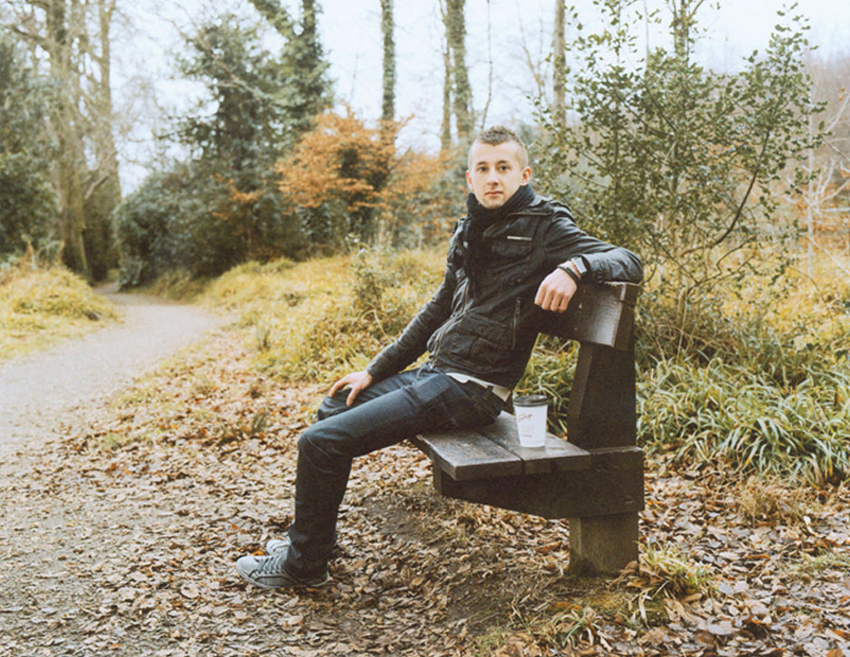 man sitting on a bech