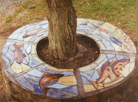 photo of Handmade Ceramic Tiles bench around a tree