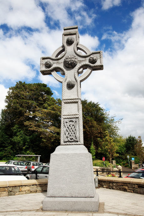 full photo of stone cross